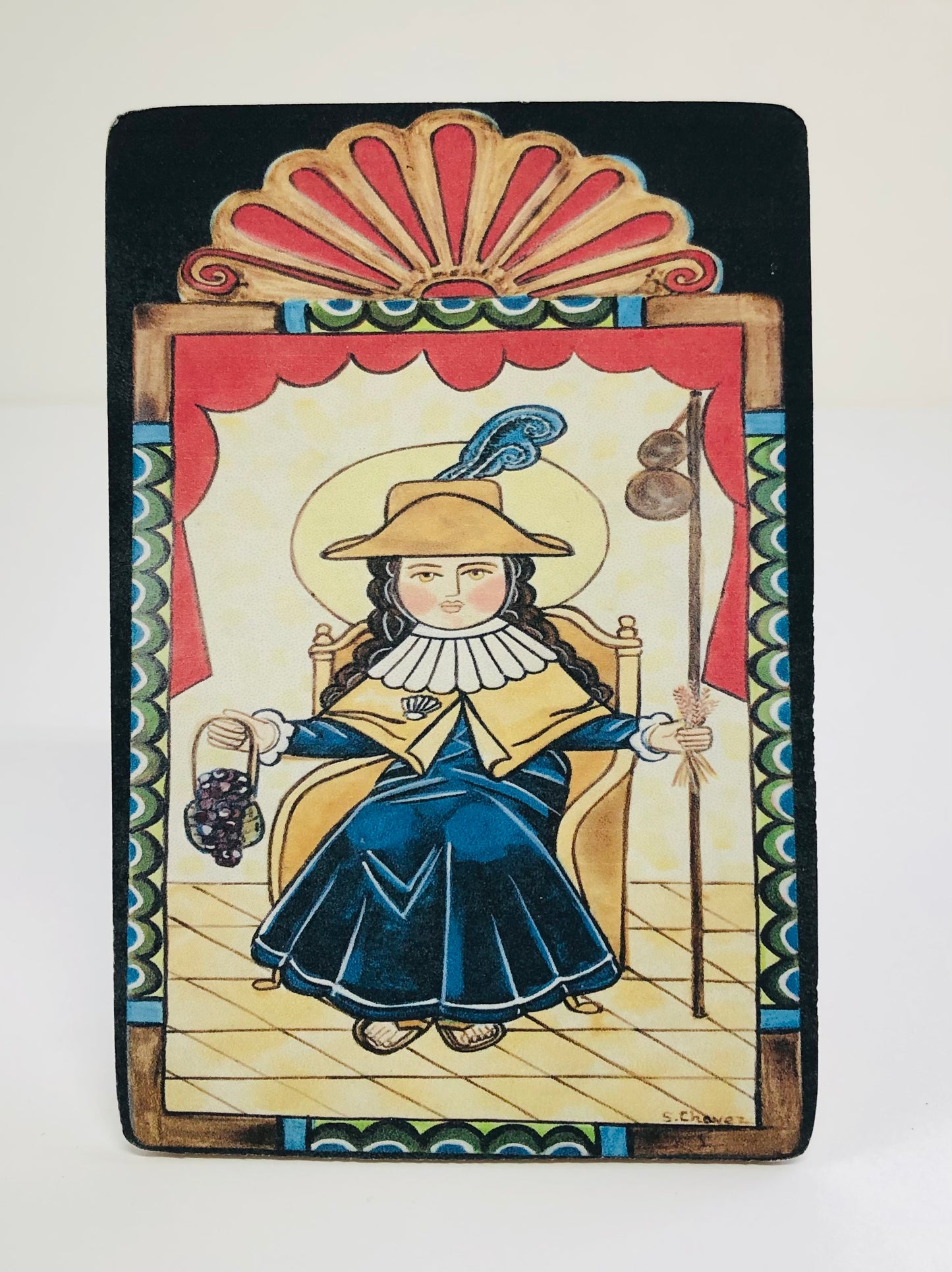 San Pasqual  Patron of cooks. chefs, and kitchens.  Feast Day: May 17th   Retablo is a devotional painting using iconography derived from traditional Catholic church art.    Replica is a duplicate of the original artwork.  3.5” X 5” digital photo with protectant on a wood panel.       Artist: Shawna Lee Chavez